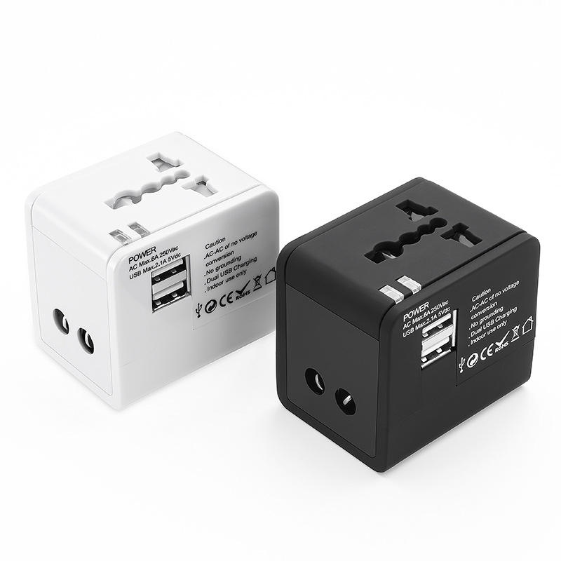 दोहोरो USB पोर्टहरूको साथ विश्वव्यापी यात्रा एडाप्टर